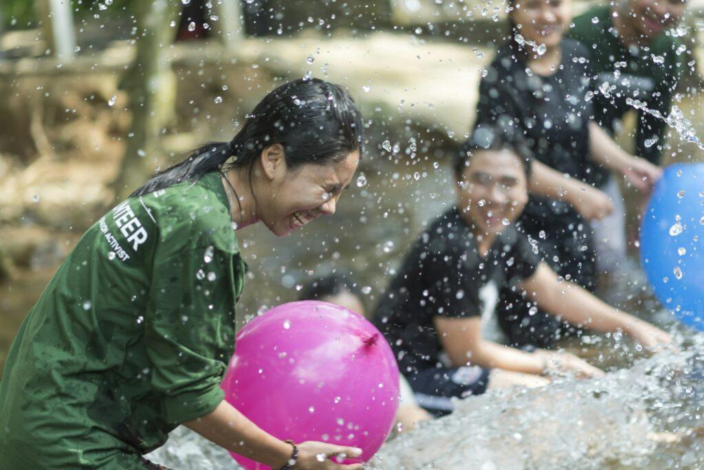 Young people playing a team with nature locations to Team building in Nakhonnayok, Thailand